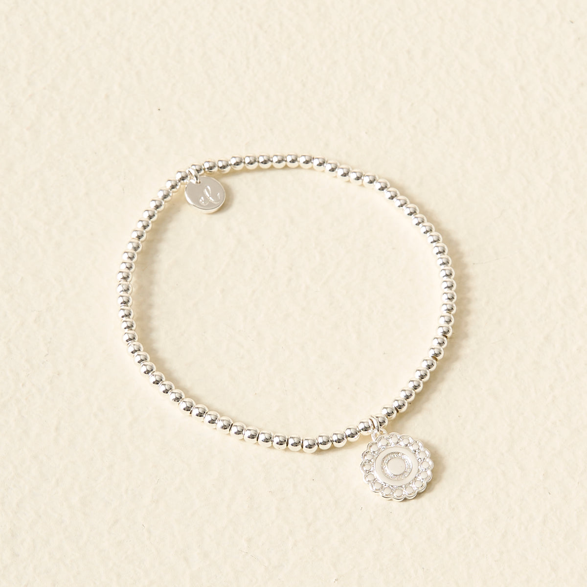 Trait Beaded Charm Bracelets