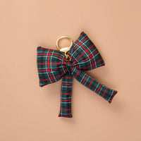 Classic Plaid Puffy Bow Bag Charm featuring a puffy green, red, and white plaid oversized bow on a gold ring clasp.