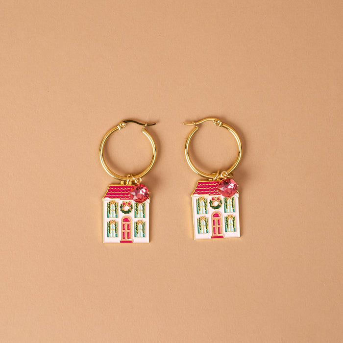 BowBelle Manor Signature Hoop Earrings featuring lightweight charms shaped like white houses with pink roofs, decorated with wreaths and small pink crystals.