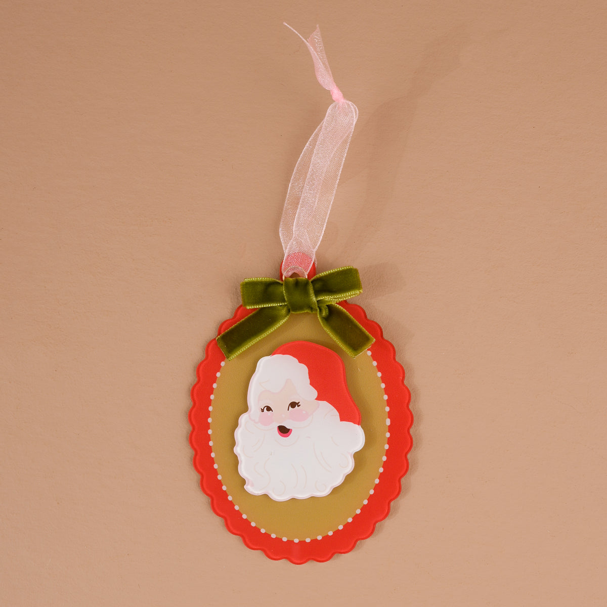 Retro Santa Acrylic Ornament featuring an oval-shaped design with a retro Santa Claus illustration, trimmed with a green ribbon bow and a hanging loop for elegant holiday styling.