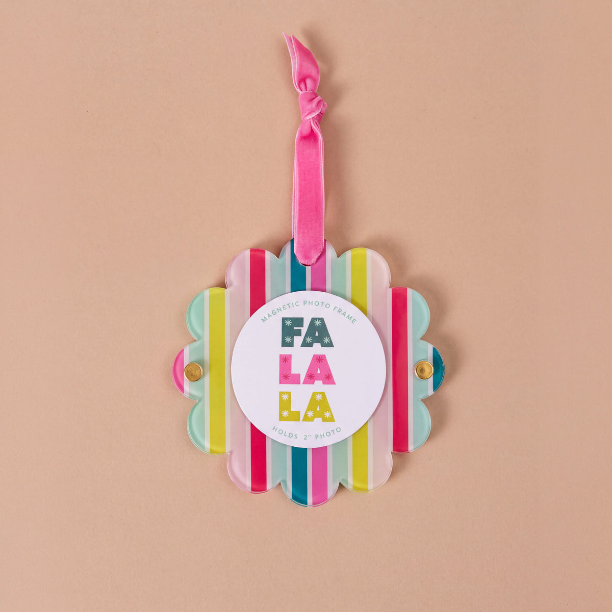 Fa La La Scalloped Round Picture Frame Ornament featuring a scalloped round frame with vertical multi-colored stripes, a pink hanging ribbon, and a central magnetic insert that reads Fa La La.