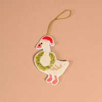 Merry Silly Goose Handcrafted Beaded Ornament featuring a goose wearing a red Santa hat and green wreath with a gold hanging cord.