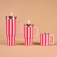 Three Peppermint Stripes 14 oz Insulated Mugs of varying heights, each featuring pink and white vertical stripes, a pink handle, and a clear lid with a pink straw.