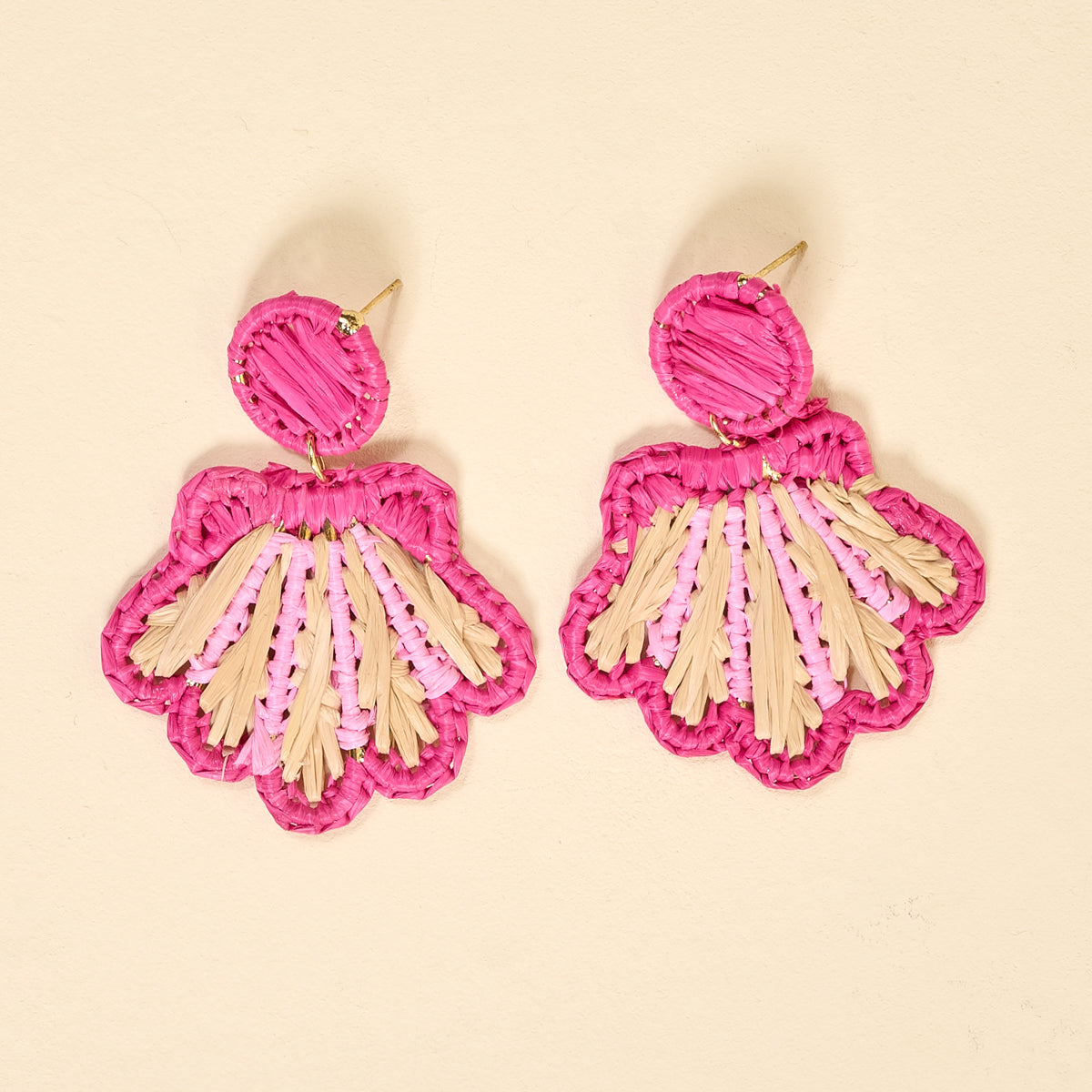 The Darling Effect’s Hot Pink Cabana Breeze Earrings feature lightweight boho style with circular tops and pink, beige, and light purple fan pendants—an eye-catching pair perfect for everyday wear.