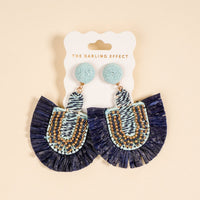 The Darling Effect Navy Fringe Earrings feature beaded accents and navy rope detail—perfect, lightweight boho earrings for effortless everyday wear.