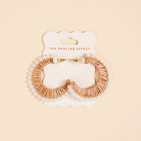 The Darling Effect’s Golden Sand It-Girl Earrings are lightweight, semicircular boho earrings with pinkish-gold wire and white beaded borders, shown on a branded card against a light beige background—perfect for daily wear.