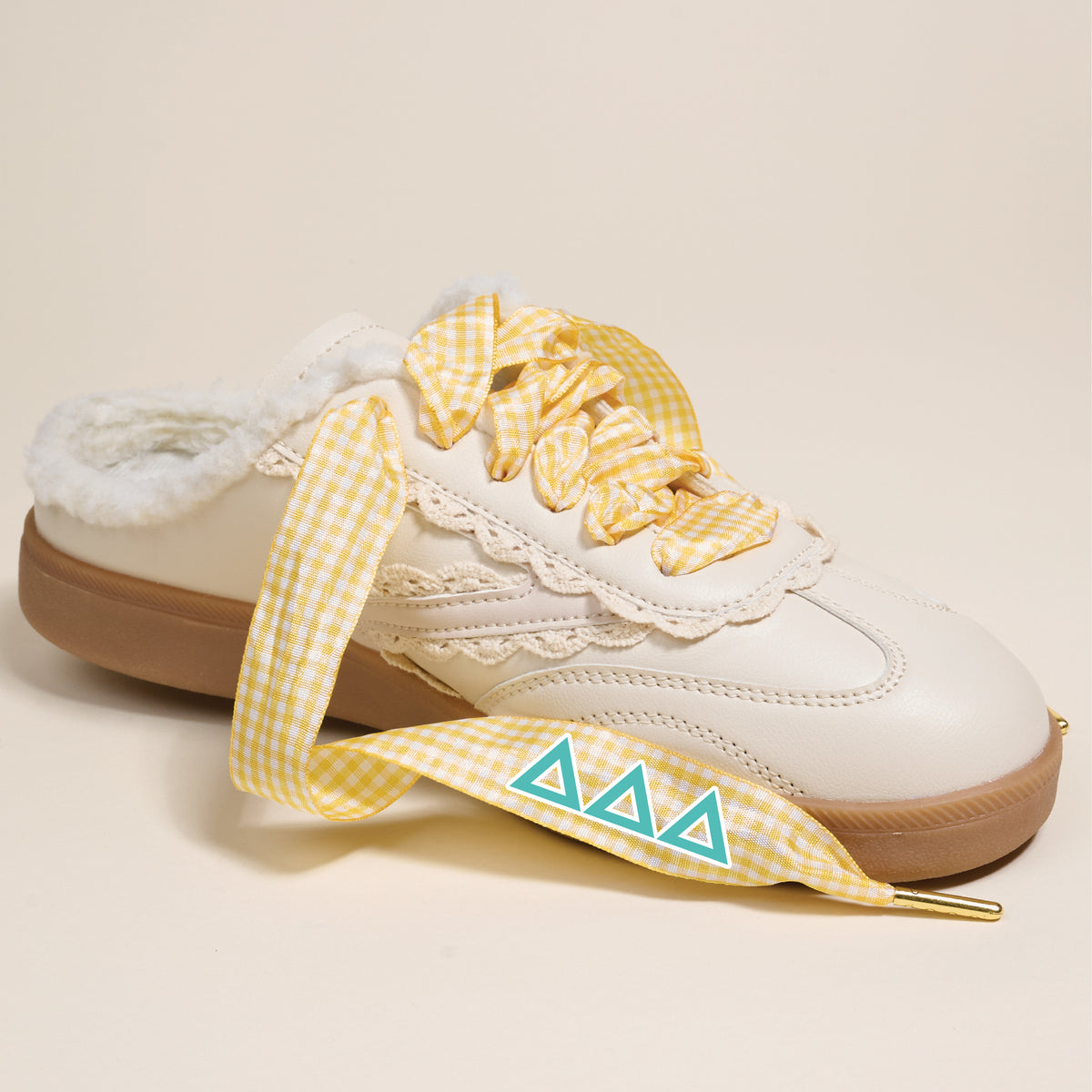 Add playful sorority style to your look with The Darling Effect’s Delta Delta Delta Step It Up Shoelaces—featuring yellow gingham laces for a fun, spirited touch perfect for brightening up any slip-on sneaker!.