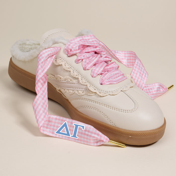 The Darling Effect’s Delta Gamma Step It Up Shoelaces feature pink gingham pattern, blue Delta and Gamma Greek letters on the lace tips—an ideal sorority accessory for adding a cozy, stylish touch to your favorite sneakers.
