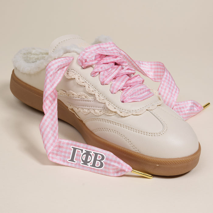 The Darling Effect's Gamma Phi Beta Step It Up Shoelaces feature pink gingham with white “ΓΦΒ” Greek letters—perfect for sorority gifts or to personalize your sneakers with a chic, collegiate touch.