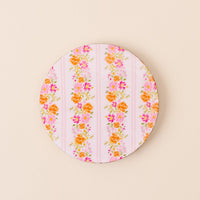 The-darling-effect's Petal Parade Pink Wood Enamel Coaster features pink and white stripes with floral clusters, adding charm to your table while protecting surfaces.
