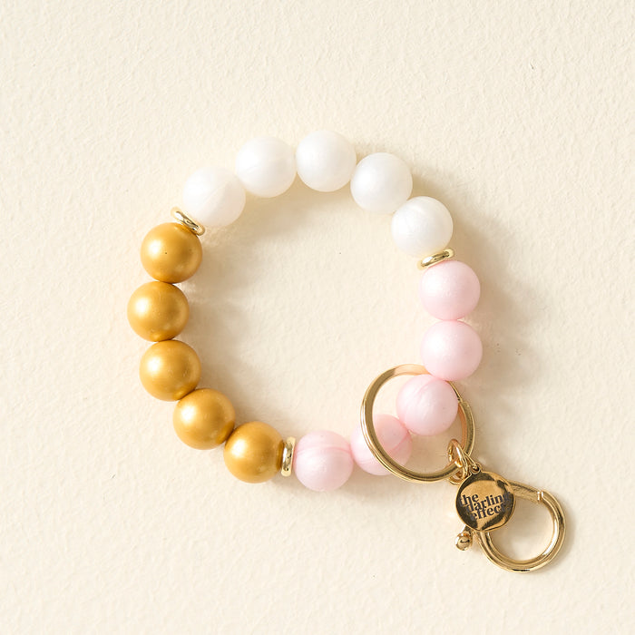 Pop The Champagne Hands-Free Keychain Wristlet