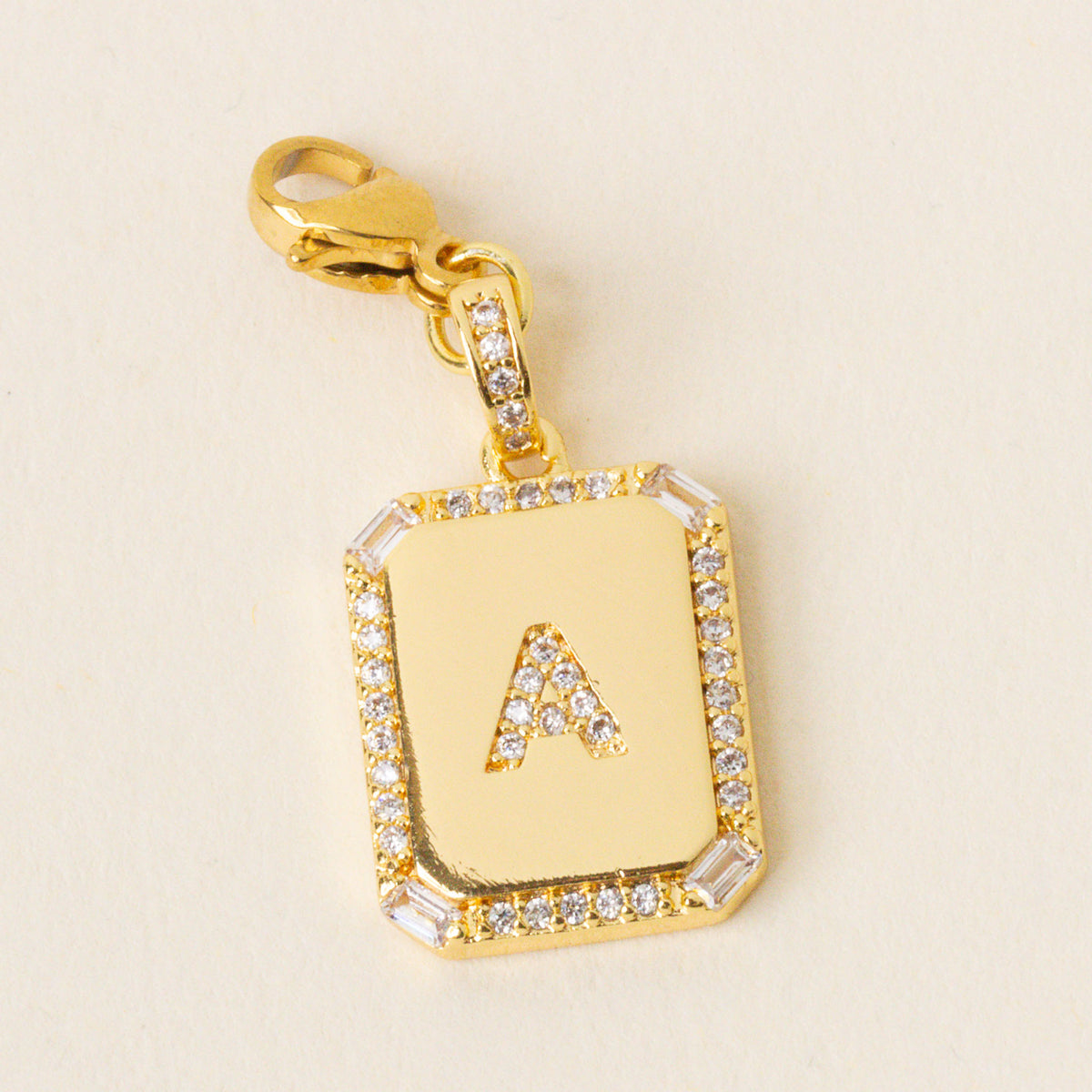 A Jewelry Charm Initial Letter Gold