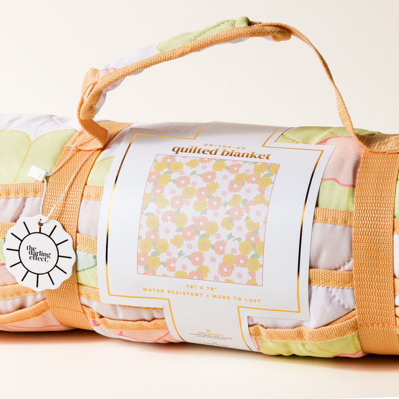 Daisy Craze Peach On-the-Go Quilted Blanket
