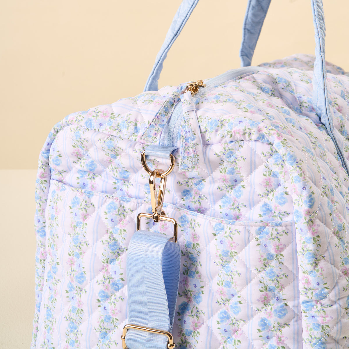 Petal Parade Blue On-the-Go Quilted Weekender Bag