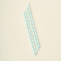 The Darling Effect's Check Blue 40 oz Tumbler Straw Set features four patterned blue reusable straws, arranged side by side on a plain off-white surface.