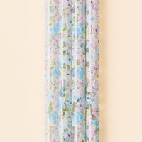 The Secret Garden Blue 40 oz Tumbler Straw Set by the-darling-effect features clear BPA-free reusable straws with a pastel blue and purple floral pattern—perfect for adding a touch of charm to your tumbler.