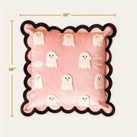 The Darling Effect’s Boo Crew Scalloped Square Throw Pillow features an 18-inch pink design with black trim and white terry cloth ghosts, adding a playful Halloween touch to your sofa or pillow collection.