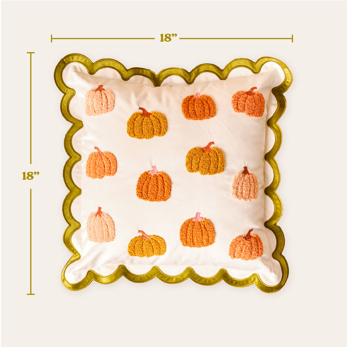 A Pumpkin Patch Scalloped Square Throw Pillow, featuring an 18-inch square white base with embroidered orange pumpkins and a scalloped green border.