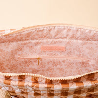 Quilted gingham tote bag interior with fabric lining and zip pull tab
