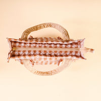 Quilted gingham tote bag with top handles and layered ruffle trim