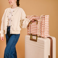 Quilted gingham tote bag with open top and front panel featuring stitched rows