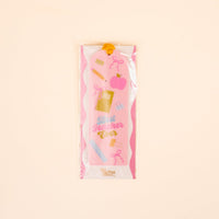 The Darling Effect's Best Teacher Ever Acrylic Bookmark features pink and white colors, school-themed illustrations, and “Best Teacher Ever” text. It comes in clear plastic packaging with a yellow ribbon, making it a perfect gift for book lovers.