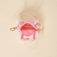 The Darling Effect Oh So Fancy Pink Itty Bitty Duffle Bag Charm is a small pink quilted pouch with floral print, gingham-lined interior, handles, a top zipper, and gold keychain clip—perfect as a cute bag accessory.