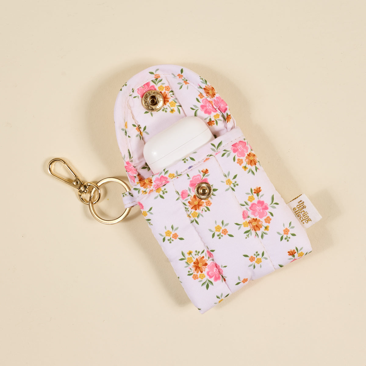 Endless Daydream Cream Puffy Earbud Case Keychain