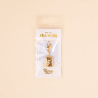 The C Jewelry Charm Initial Letter Gold by the-darling-effect is a gold-plated charm, perfect for personalized jewelry. It comes on an OH SO charming card, packaged in clear plastic with a light beige background.