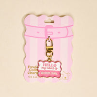The Darling Effect's Good Girl Pawfect Collar Charm is a gold keychain with a pink and white "Hello my name is GOOD GIRL" tag, pet-style packaging, collar charms, and a cute dog illustration in the corner.