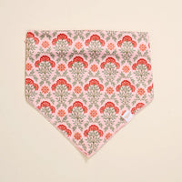 The Darling Effect’s Bow-Wow Pet Bandana-Everbloom Dusty Rose features a floral design in pink and red with green stems—an ideal stylish accessory for fashionable dogs and their pet parents.
