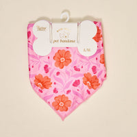 The Darling Effect Bow-Wow Pet Bandana-Poppin' Petals Hot Pink is a stylish pink cotton bandana with red and orange florals, sized L/XL, packaged for your furry friend.