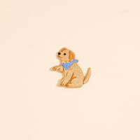 The Darling Effect's Dog Mix & Match Iron-On Patch features a light brown dog with a blue bandana on a beige background—perfect for adding a cute, colorful touch to bags or jackets.