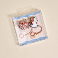 The Darling Effect Cat Mom Straw Topper Set includes leak-resistant silicone toppers with a "Cat Mom" design and cute white cat illustration, displayed on blue-striped backing—perfect drinkware accessories for cat lovers.