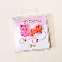 The Darling Effect’s Classic Cowgirl Straw Topper Set includes pink cowboy boot and orange Yall silicone toppers—perfect leak-resistant drinkware accessories. Packaged in a clear box with a pink insert.