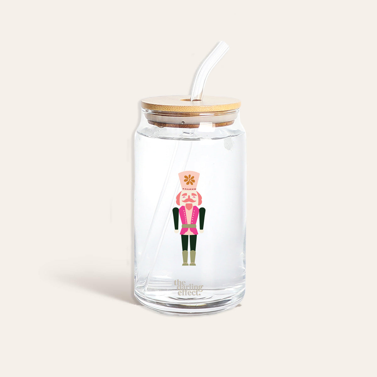 Round Libbey glass cup from The Darling Effect, featuring a bamboo lid, clear straw, and a festive Holiday Check design on the front. “The Darling Effect” is printed near the bottom of this stylish Round Glass Cup.